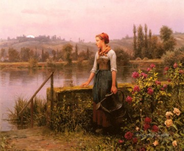 Una mujer con una regadera junto al río, paisana Daniel Ridgway Knight Pinturas al óleo